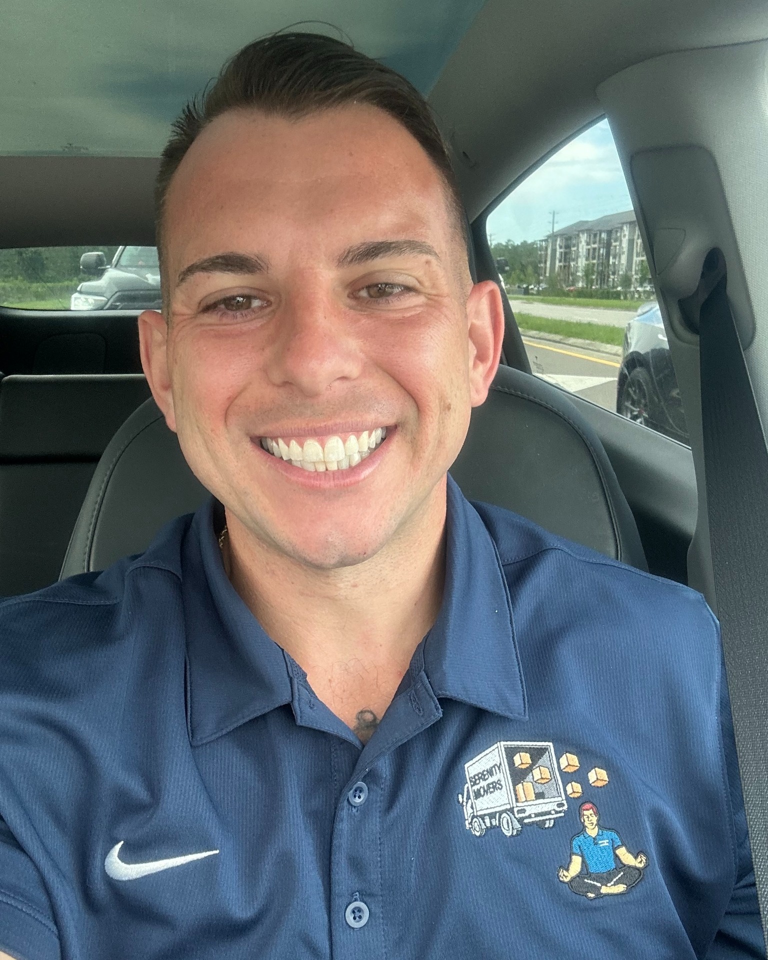 Man sitting inside a car